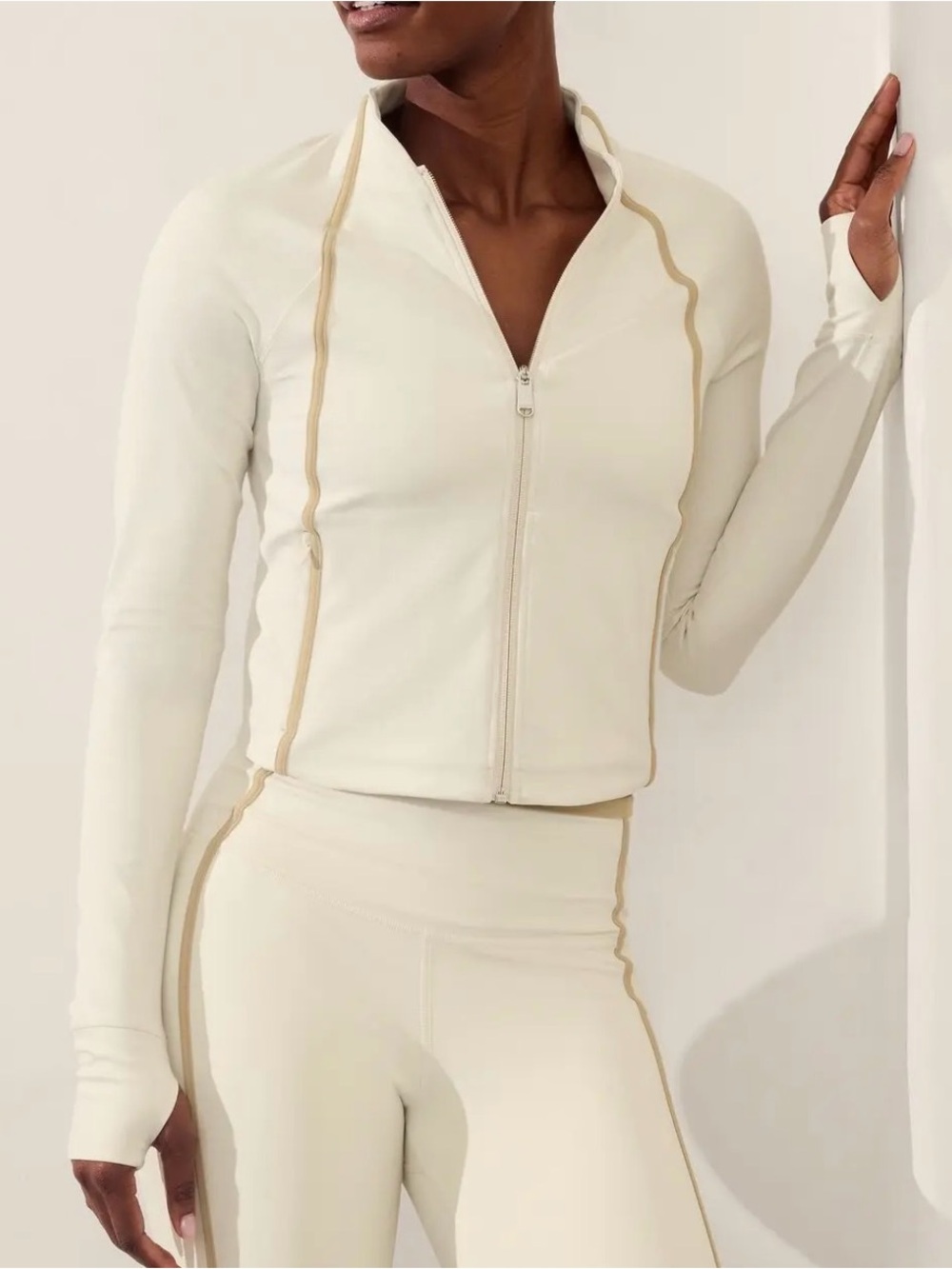 Athleta Salutation Crop Jacket in a cream and tan colorway
